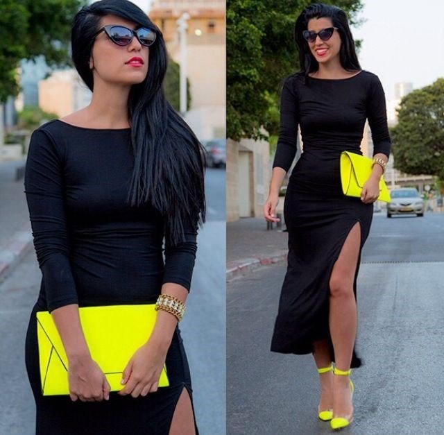 Black dress shop with neon